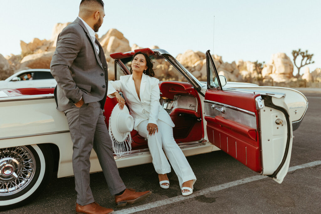 joshua treen engagement photoshoot of couple in front of a vintage car